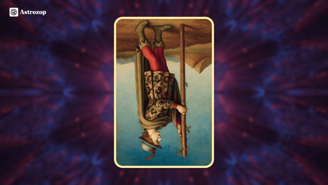 Reversed Page of Wands tarot card showing a young traveller holding a wand upside down